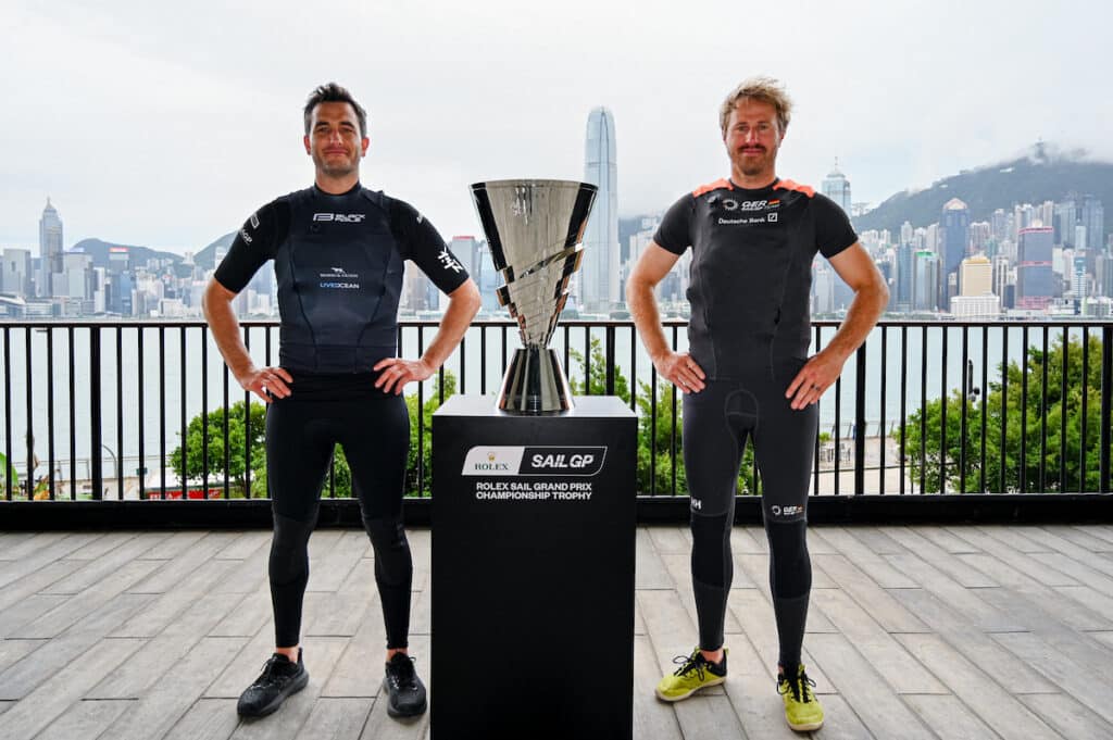 IMAGE Blair Tuke Black Foils SailGP Team Erik Heil Germany SailGP Team with Rolex SailGP Championship Trophy